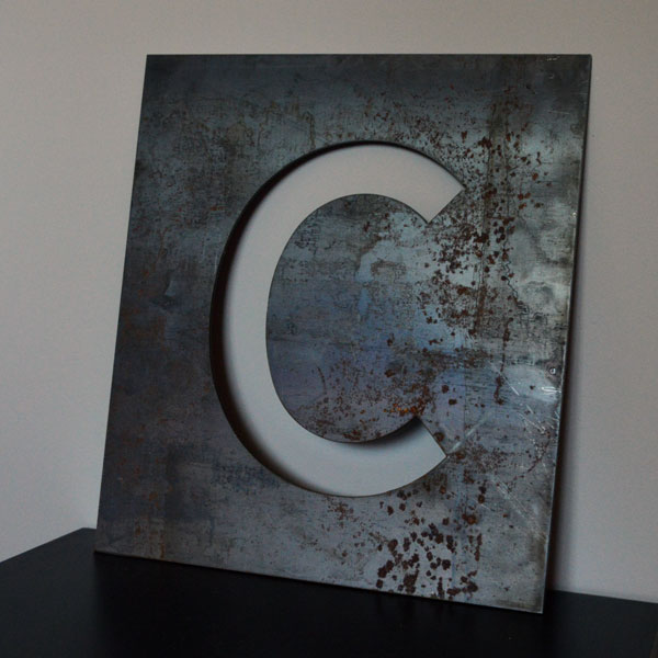 Steel cutout letter C